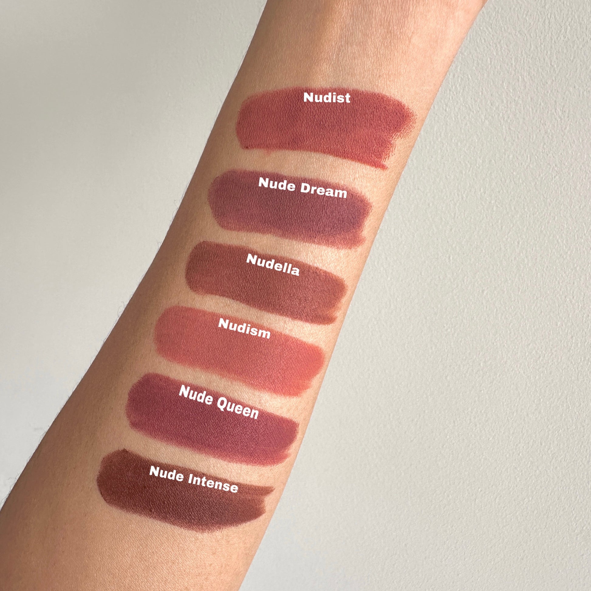 Soft blur matte Lipstick swatches on a person's arm with shade names. Best shades for Indian skin tones