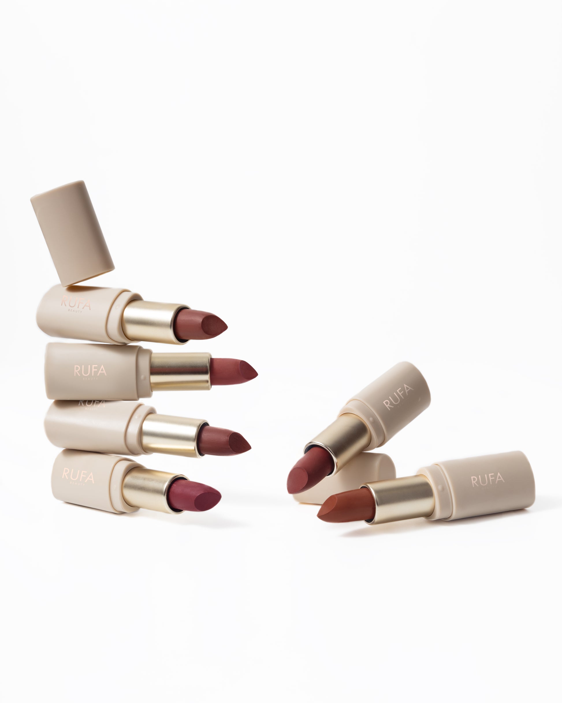 This video features a collection of RUFA brand lipsticks in a Soft Blur Matte finish. The lipsticks are displayed in a variety of shades, ranging from a light peach tone to dark brown, each providing a matte finish with a subtle, soft blur effect on models and swatches including mentioning the features